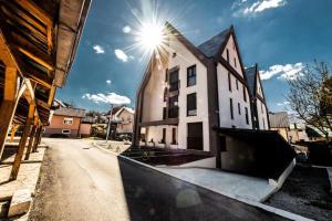 Bygningen som lejligheden ligger i + 4 billeder