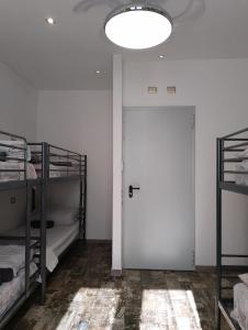 Posteľ alebo postele v izbe v ubytovaní Atmos Luxe Navigli
