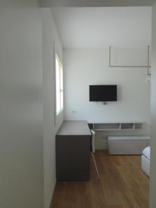 TV a/nebo společenská místnost v ubytování el Zhìgol B&B