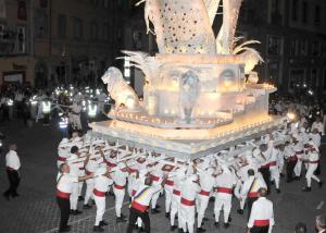a group of people in santa claus costumes in a parade at Il CASALE NELLA TUSCIA. BIOFARM. Casa nel Giardino in Viterbo