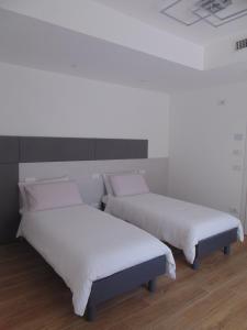 Postel nebo postele na pokoji v ubytování el Zhìgol B&B