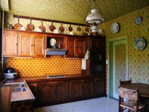 Dapur atau dapur kecil di Maison bourgeoise dans un vignoble