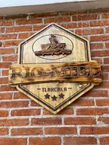 Certificado, premio, señal o documento que está expuesto en Hotel RioMiel Tlaxcala