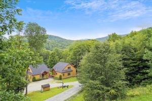 an aerial view of a house in the woods at Distinctive 4 bedroom townhouse, with outdoor hot tub minutes from the slopes Winterberry 4 in Killington