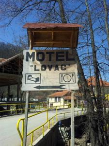 a sign for a motellorlorlor at Lovac in Štrpce