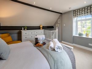 Llit o llits en una habitació de Bo Peep Cottage