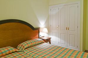 Postel nebo postele na pokoji v ubytování Apartamentos Las Mozas