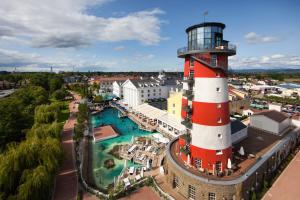 an aerial view of a lighthouse and a pool at Sohana Lifestyle Apartments I Stefan's Home I Rust in Rust