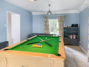 a room with a pool table with balls on it at The Old Manse - Ukc6854 in Millton of Clova