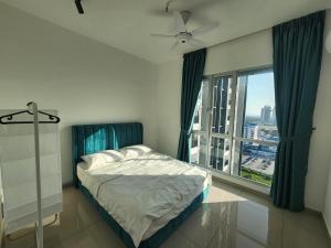 Voodi või voodid majutusasutuse Luxurious Perda City Duplex Penthouse - Bukit Mertajam toas