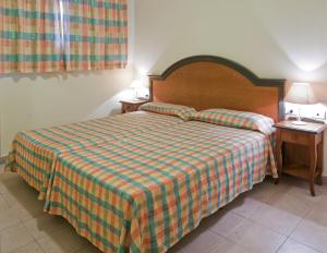 Postel nebo postele na pokoji v ubytování Apartamentos Las Mozas