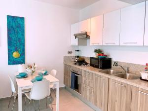A kitchen or kitchenette at Apartment in Estrella, Dominicus-Bayahibe