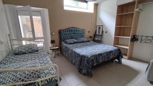 Postel nebo postele na pokoji v ubytování Ruthene Etape Appartement T3