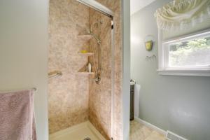 a shower with a glass door in a bathroom at Secluded Canton Vacation Rental 22 Mi to Asheville in Canton +19 photos