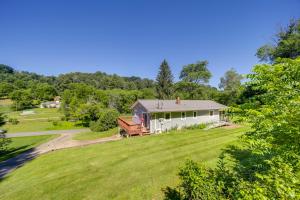 an aerial view of a white house on a lawn at Secluded Canton Vacation Rental 22 Mi to Asheville in Canton