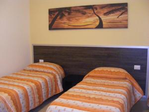 Postel nebo postele na pokoji v ubytování B&B FreeZone