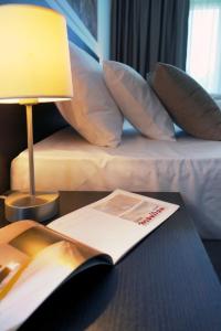 Voodi või voodid majutusasutuse Hotel Mousson toas