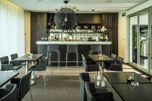 Lounge nebo bar v ubytování Hotel Mousson