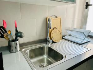 Køkken eller tekøkken på Magnifique Duplex avec terrasse proche de la plage + 20 billeder