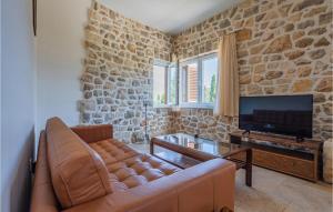 Μια τηλεόραση ή/και κέντρο ψυχαγωγίας στο Holiday Home Zman Zman