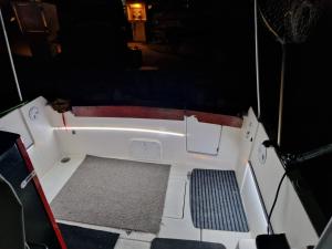 a small boat with a bath tub in a room at SAMMY SEA in Sitges