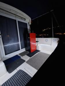 a view of the outside of a boat at night at SAMMY SEA in Sitges