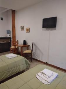 Postel nebo postele na pokoji v ubytování HABITACION CENTRO