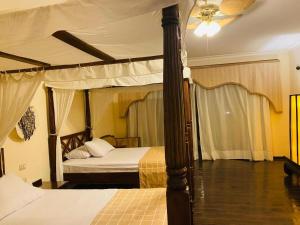Кровать или кровати в номере Domina coral bay prestige-elisir-harem
