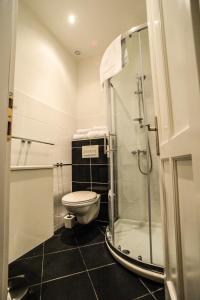 Phòng tắm tại City Center Rooms +28 ảnh