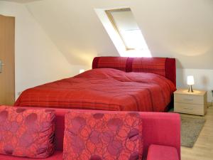 Ένα ή περισσότερα κρεβάτια σε δωμάτιο στο Ferienwohnungen mit Balkon