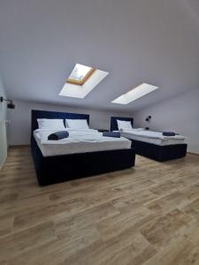 LOFT HOUSE APARTMENTS客房内的一张或多张床位