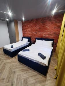 LOFT HOUSE APARTMENTS客房内的一张或多张床位