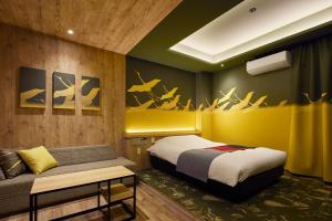 Postelja oz. postelje v sobi nastanitve ツルガナホテル-レジャーホテル-ラブホテル + 8 fotografij