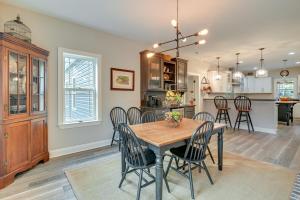 a kitchen and dining room with a table and chairs at Expansive Georgetown Home with Decks and Fire Pit! in Georgetown