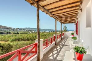 a villa with a view of the ocean at Hotel Smaragdi Apartments in Finikas