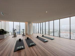 a gym with yoga mats on the floor in a building at Oceanview Paradise 2Beds Apt at Casino FreeParking in Gold Coast