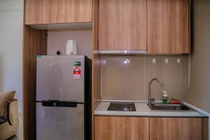 a kitchen with a stainless steel refrigerator and a sink at Mount Austin #Palazio B2 Super City View 1-2Pax #MSPro in Johor Bahru