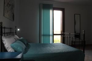 Postel nebo postele na pokoji v ubytování B&B Tramonti d'aMare