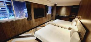 TV o dispositivi per l'intrattenimento presso 慶爾喜旅館西門捷運館Gugis Inn