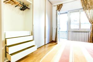 Ένα ή περισσότερα κρεβάτια σε δωμάτιο στο Lovely apartment in Rome - Casetta Mattei