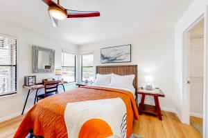 a bedroom with a bed and a desk at Canyon Oasis- Canyon View #3214 in Tucson +33 photos
