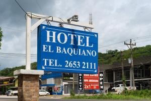 a sign for a hotel el bahuota at Hotel El Baquiano in Tamarindo