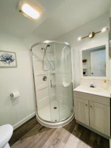 a bathroom with a shower and a sink and a toilet at Garden home in Victoria -Beautiful home in Victoria in Victoria