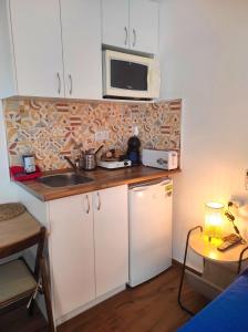 Kuchyň nebo kuchyňský kout v ubytování Apartamento Estudio Terraza Privada