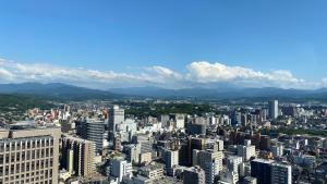 an aerial view of a city with tall buildings at Hotel Nikko Kanazawa in Kanazawa