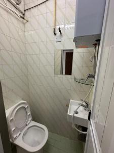 Ένα μπάνιο στο Mandarin Guest House