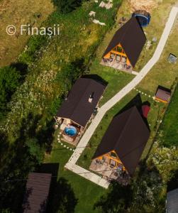an overhead view of a group of yurt homes at Finașii in Albac