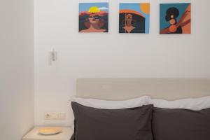 Postel nebo postele na pokoji v ubytování Anassa 9 Cozy Apartment
