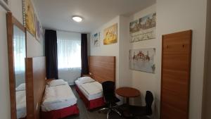 Postel nebo postele na pokoji v ubytování Apartments Gato Karlovy Vary Stara Role