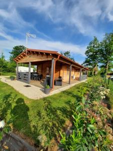 Κήπος έξω από το Marne LAC DU DER JOLI CHALET AU CHARME DU DER +24 φωτογραφίες